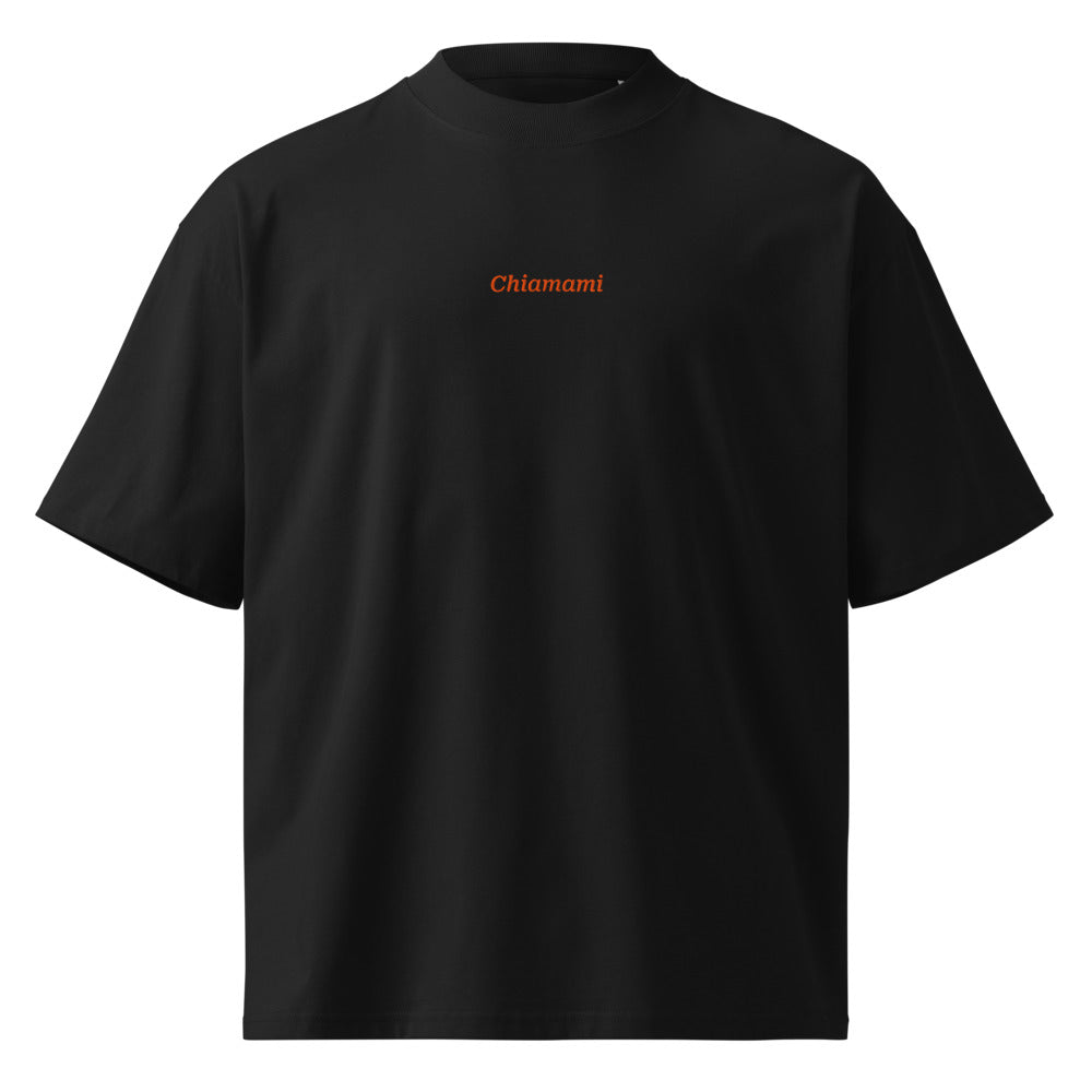 Chiamami — t-shirt oversize nera, ricamo arancione