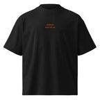 Adesso non mi va — t-shirt oversize nera, ricamo arancione