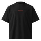 Se lo dici tu — t-shirt oversize nera, ricamo arancione