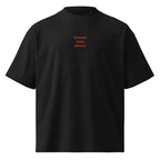 Domani sono altrove — t-shirt oversize nera, ricamo arancione
