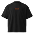 Scendo alla prossima — t-shirt oversize nera, ricamo arancione