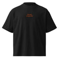 Non sto scappando — t-shirt oversize nera, ricamo arancione