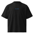 Non insisto — t-shirt oversize nera, ricamo acqua pavone