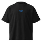 Non torno a casa — t-shirt oversize nera, ricamo acqua pavone