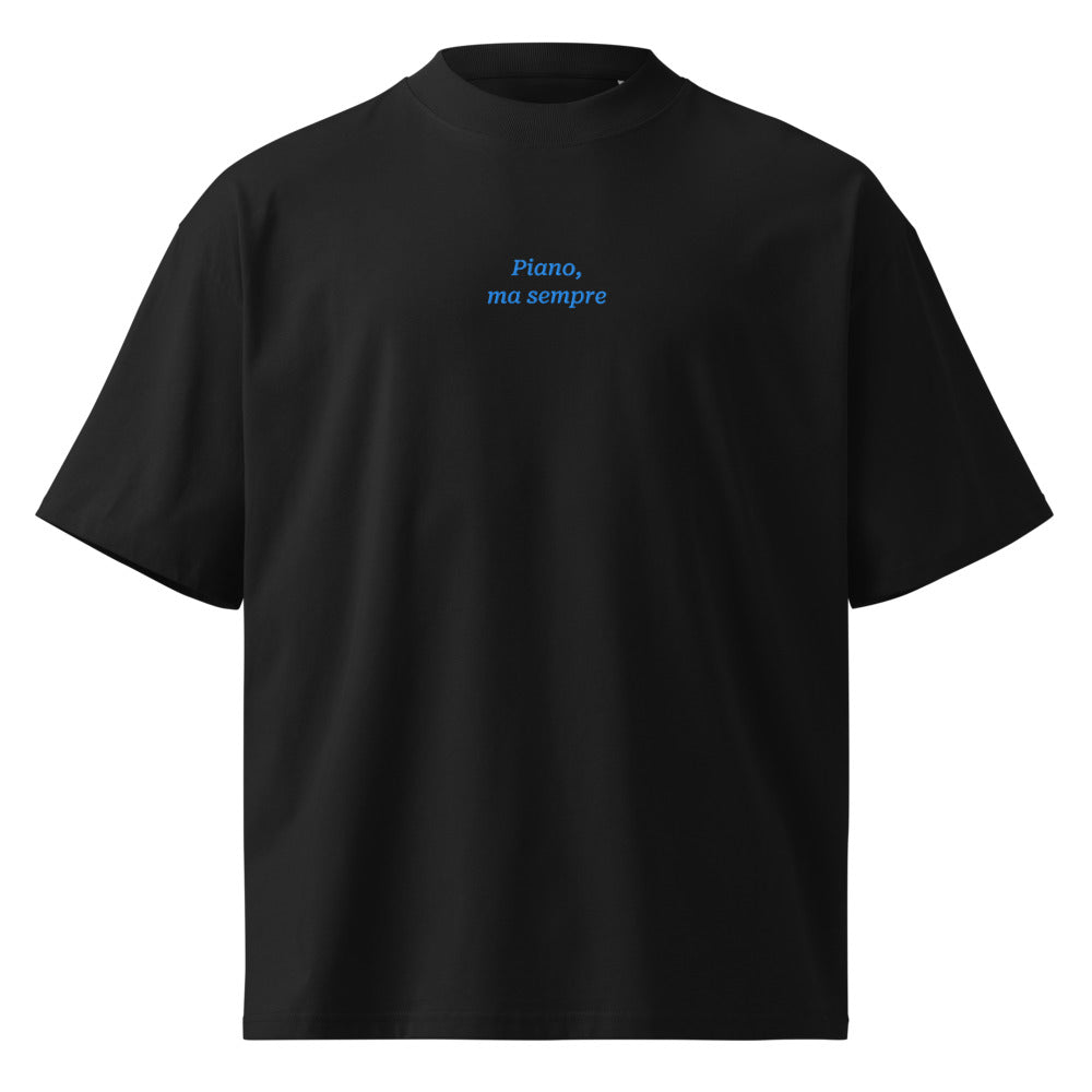Piano, ma sempre — t-shirt oversize nera, ricamo acqua pavone