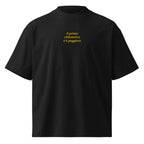 Il primo chilometro è il peggiore — t-shirt oversize nera, ricamo giallo