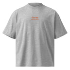 Corro per stare zitto — t-shirt oversize grigia, ricamo arancione