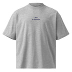 Non ti riguarda — t-shirt oversize grigia, ricamo blu