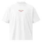 Casa è dove torno — t-shirt oversize bianca, ricamo arancione